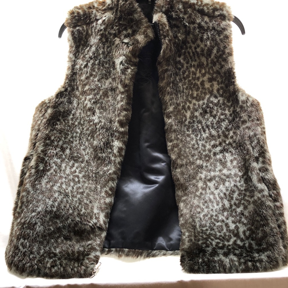 Guess large faux vest. Great for cold weather